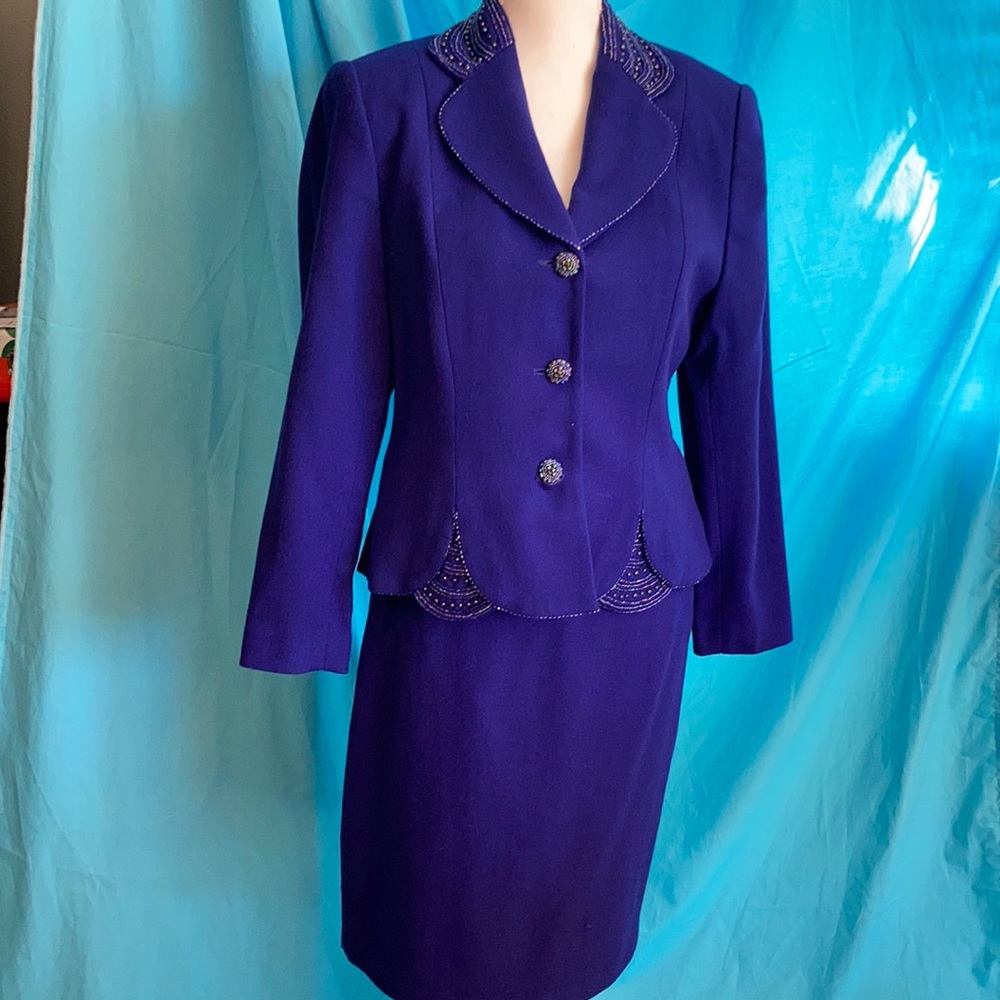 Royal blue 2 piece suit with skirt.
